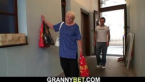 Busty 70 years grey blonde grandma pleases young stud