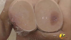 Pressed my breasts against chum around with annoy glass coupled with then masturbate with a stream of water